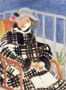 Mlle Matisse in un cappotto scozzese a quadri