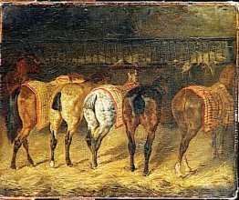 Cinque cavalli visti da dietro con croupes in una stalla
