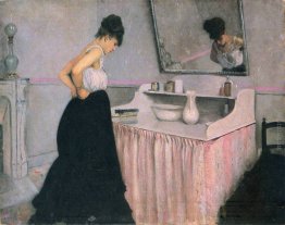 Donna al tavolo della toilette