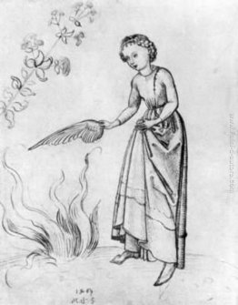 Giovane donna Fanning un incendio con l'ala di un uccello