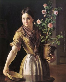 Una ragazza con un vaso di rose