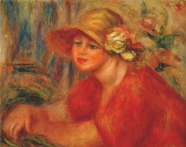 Donna in un cappello con i fiori