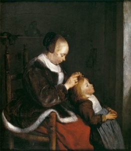 Madre pettinare i capelli del suo bambino